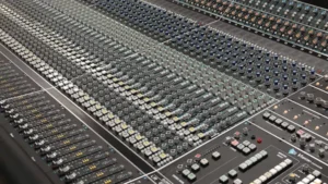 Professional mastering and hybrid audio production setup built around the API Vision+ large-format analogue console