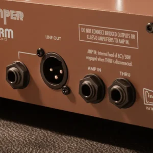 Warm Audio Reamper connected to guitar pedals and studio outboard gear in a hybrid production setup