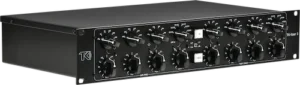 Professional mastering engineer using a Baxandall analog EQ for stereo bus tonal refinement