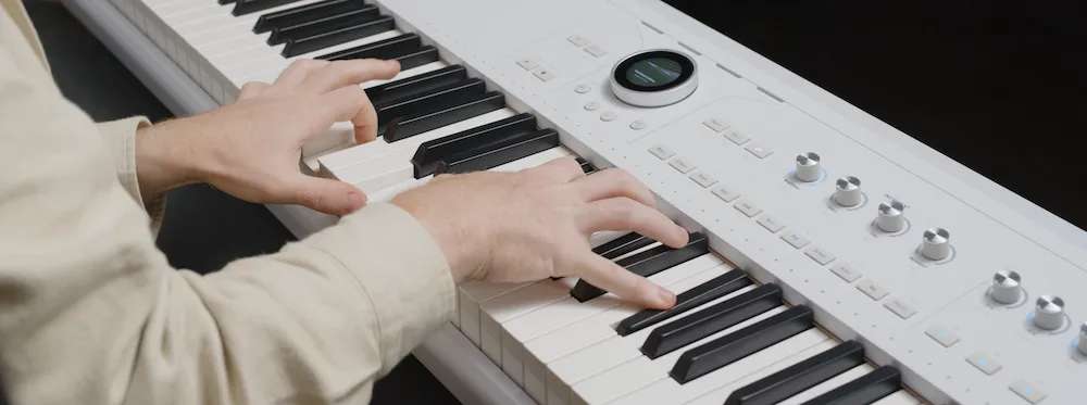 Arturia AstroLab 2.0 stage keyboard in a modern music production studio